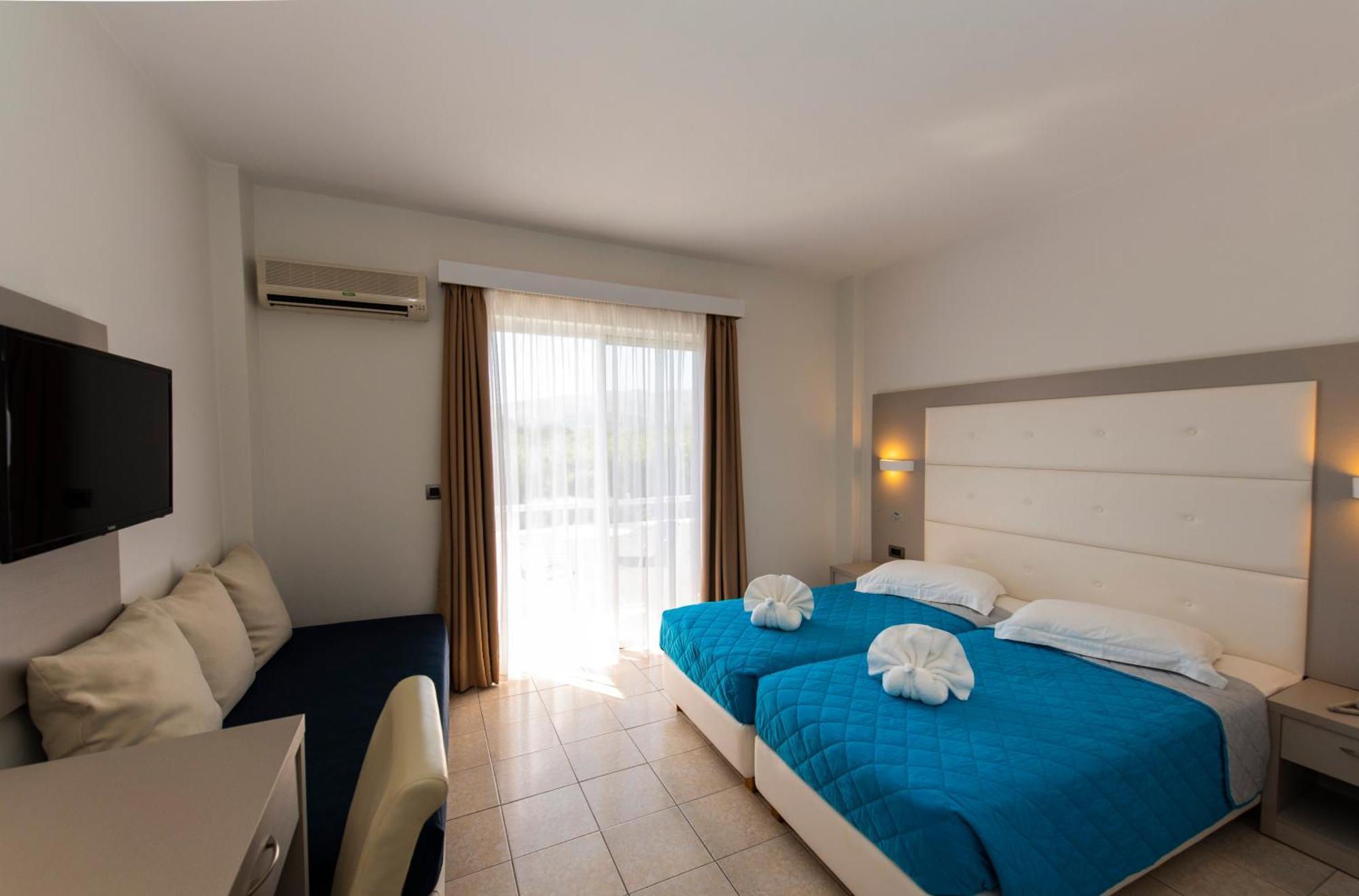 Costa Angela Seaside Resort Exterior photo